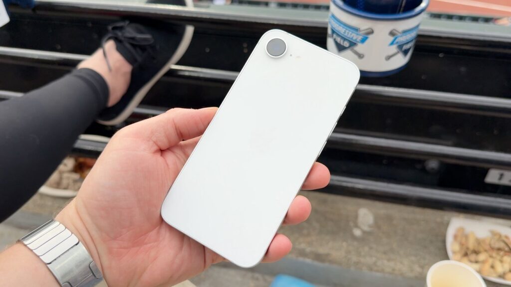 63739-132631-iPhone-16e-at-Baseball-Game-xl