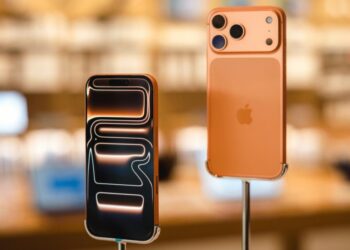 iPhone a graf růstu prodejů na pozadí