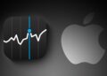Logo Apple před grafem růstu akcií