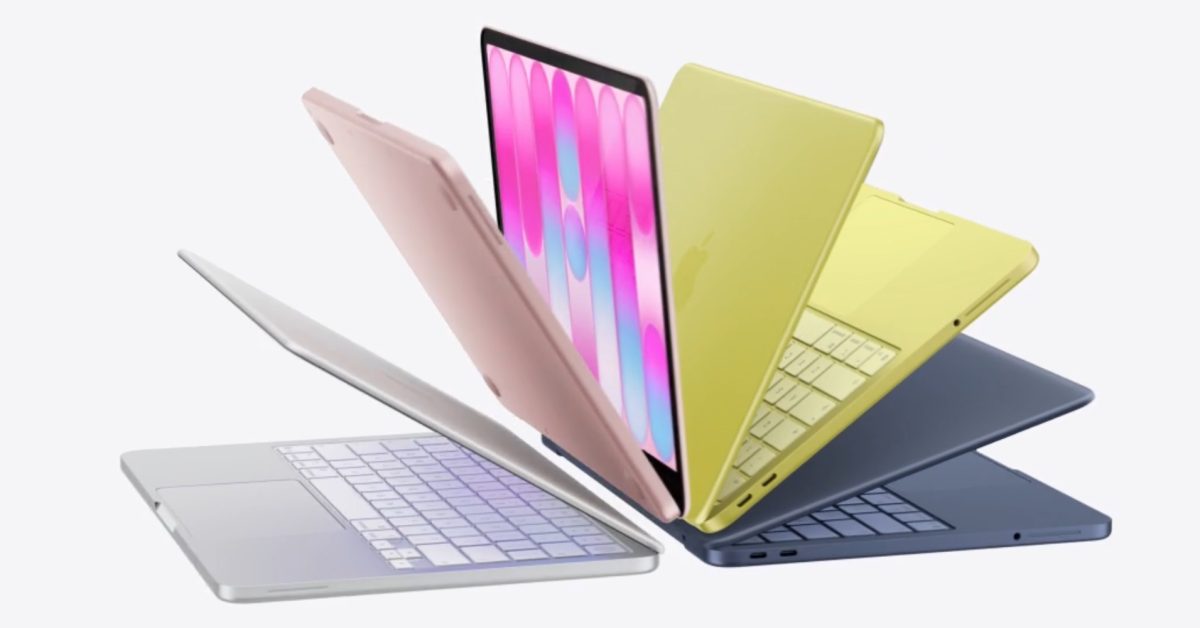 MacBook na stole vedle grafu růstu dodávek Maců