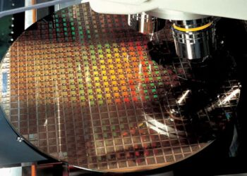 Čip TSMC a logo Applu