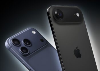 iPhone v ruce a přehled podílu Applu na prémiovém trhu