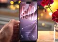 iPhone s náhledem novinek systému iOS 27.2